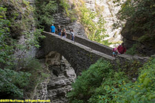 hikers on bridge