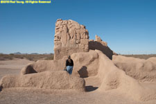 Charlotte examining small ruin